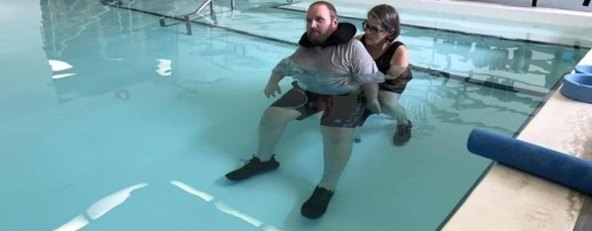 Sports coach motivated by small gains one year after spinal cord injury