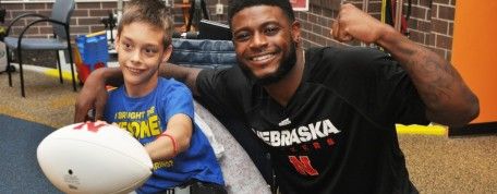 Husker surprises his #1 fan with a visit to the Lincoln Campus