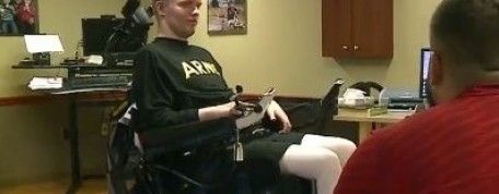 Husker football players visit paralyzed Nebraska National Guard soldier in Lincoln hospital (KETV)