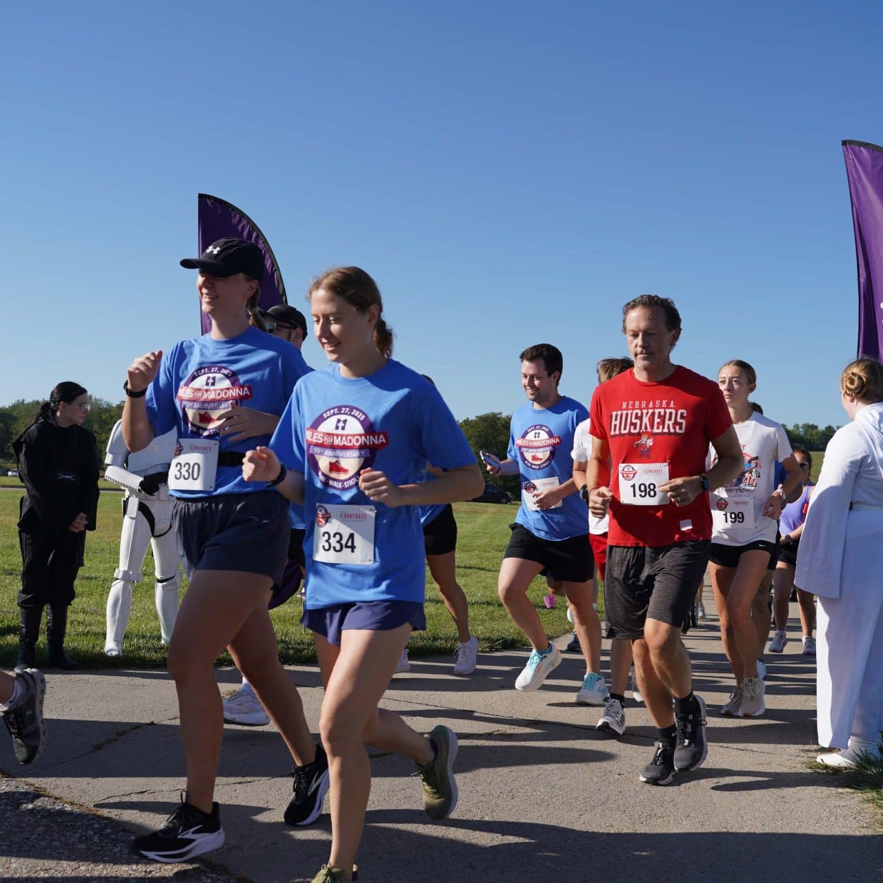 Miles for Madonna attendees running together