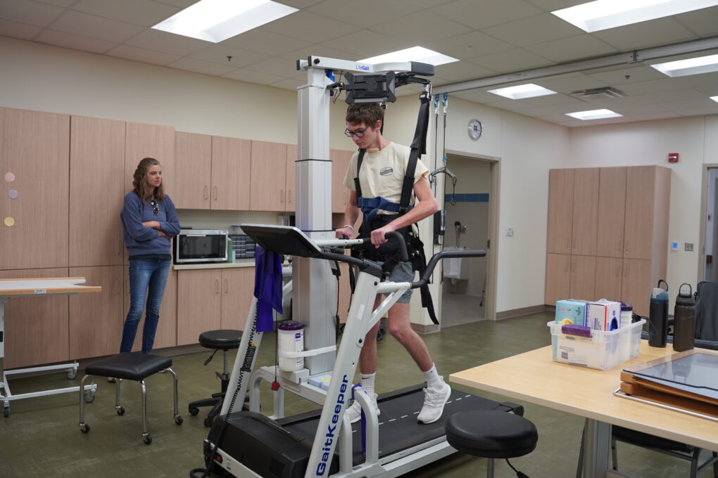 Iowa teen’s brain injury recovery measured in pushups and cheeseburgers